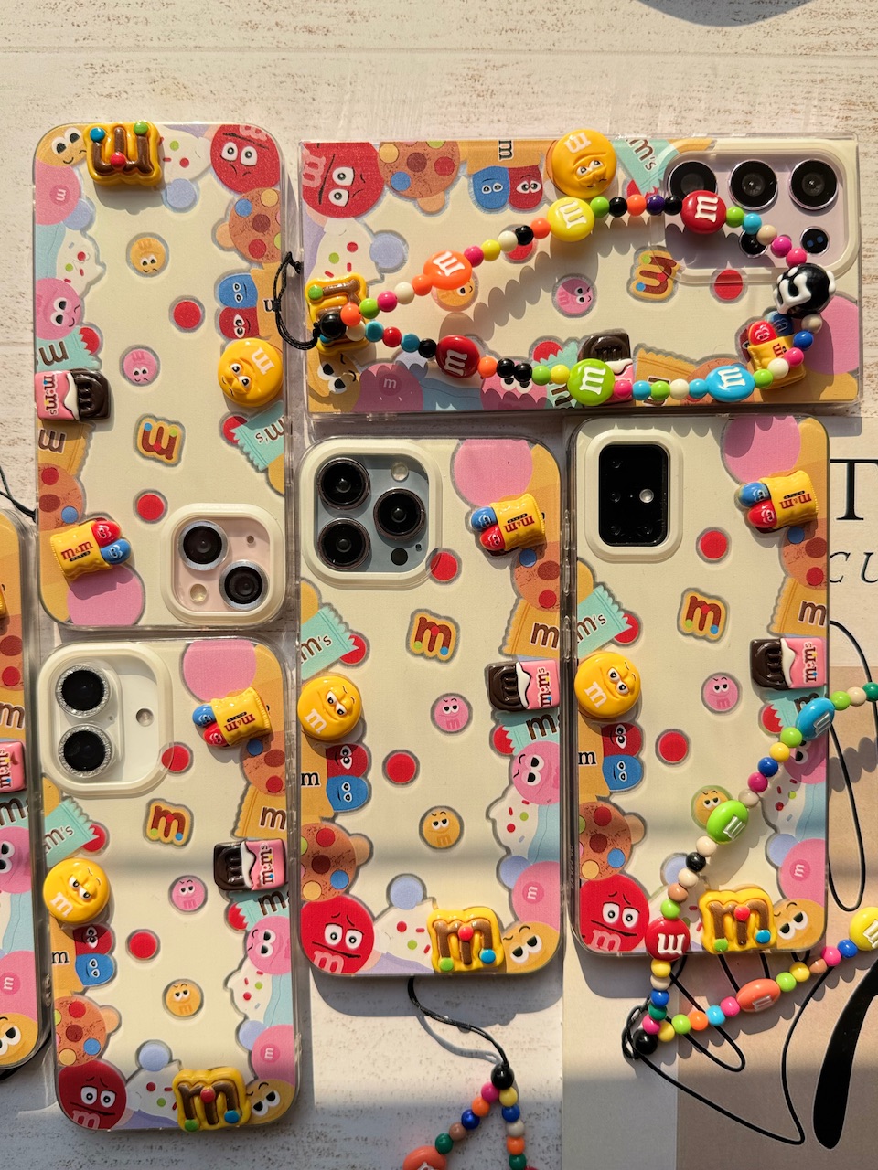قاب M&M Land با آویز آیفون سامسونگ شیائومی (کدC1917)